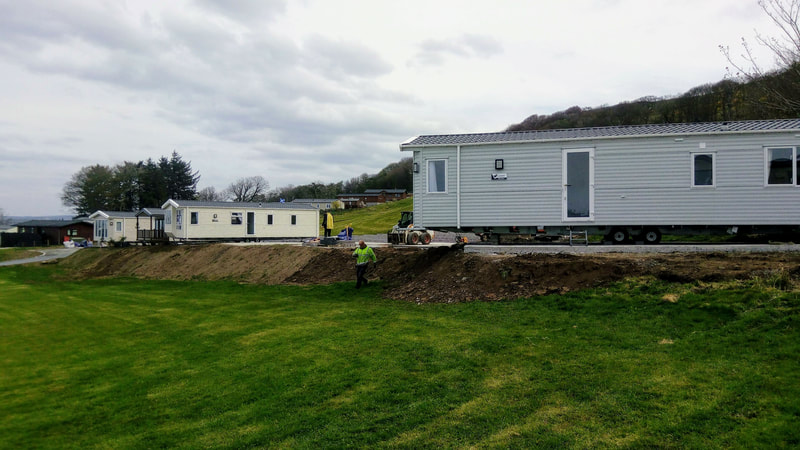 sea view caravan pitches at Ardmillan Castle Holiday Park on the West Coast of Scotland, click here